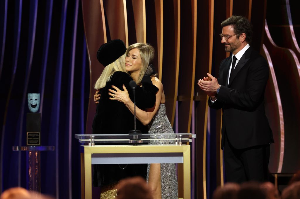 Barbra Streisand accepts the SAG Lifetime Achievement Award from Jennifer Aniston and Bradley Cooper onstage during the 30th Annual Screen Actors Guild Awards at Shrine Auditorium and Expo Hall on February 24, 2024 in Los Angeles, California.