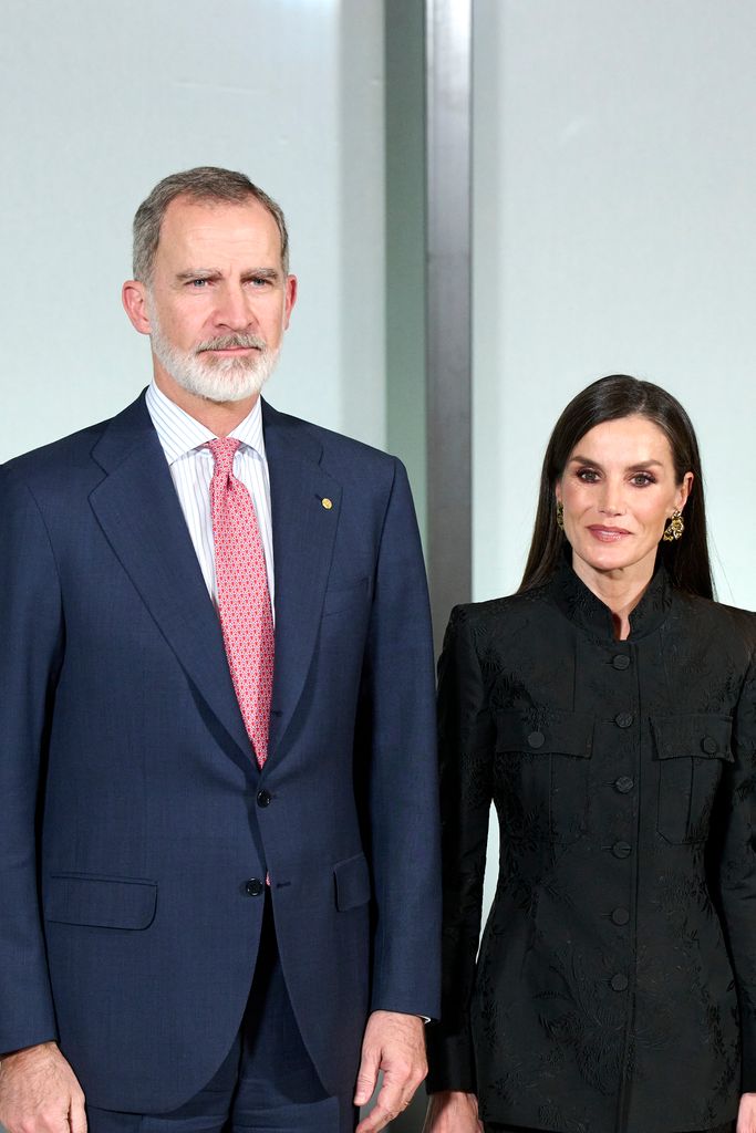 King Felipe in blue suit and Queen Letizia in black suit
