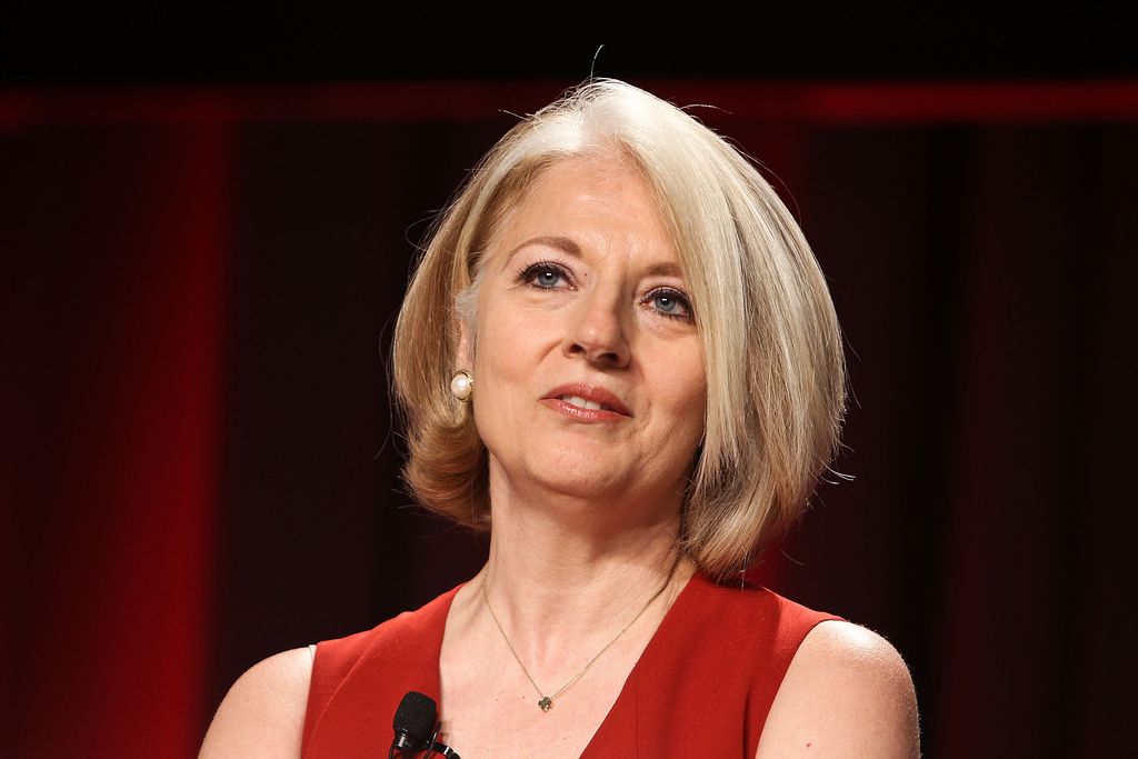 Cynthia Germanotta in a red dress