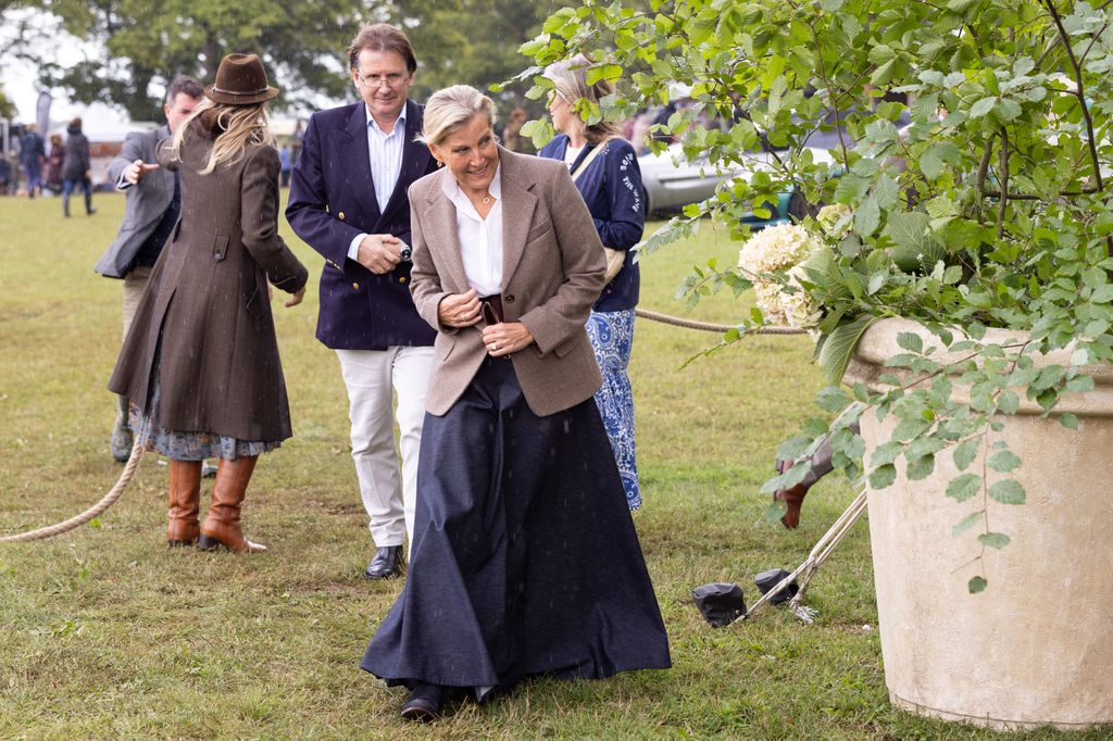 Sophie ducked from the showers