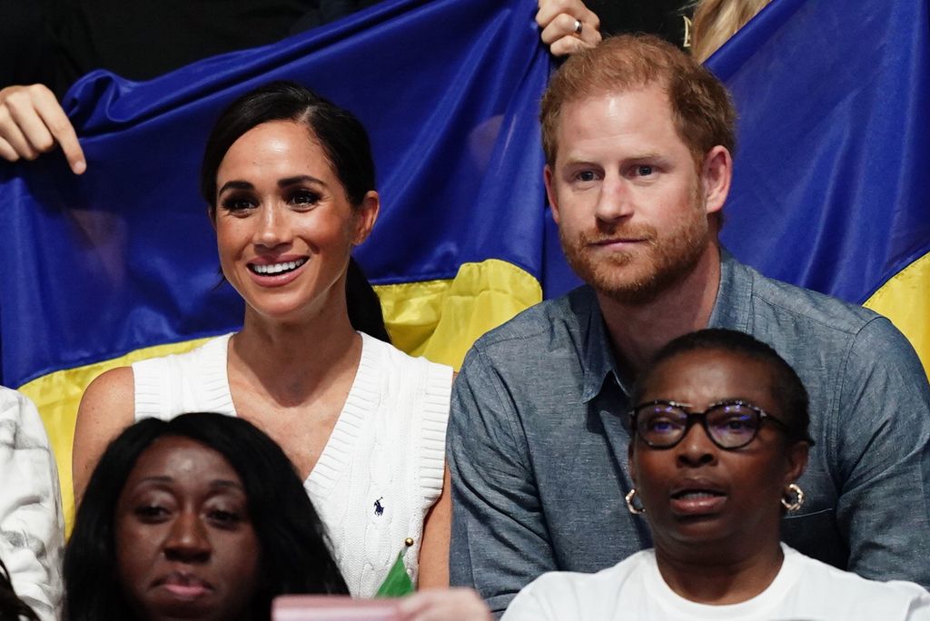 The Duke and Duchess of Sussex watch the sitting volleyball competition on field one at the Merkur Spiel-Arena during the Invictus Games in Dusseldorf, Germany. Picture date: Thursday September 14, 2023. (Photo by Jordan Pettitt/PA Images via Getty Images)