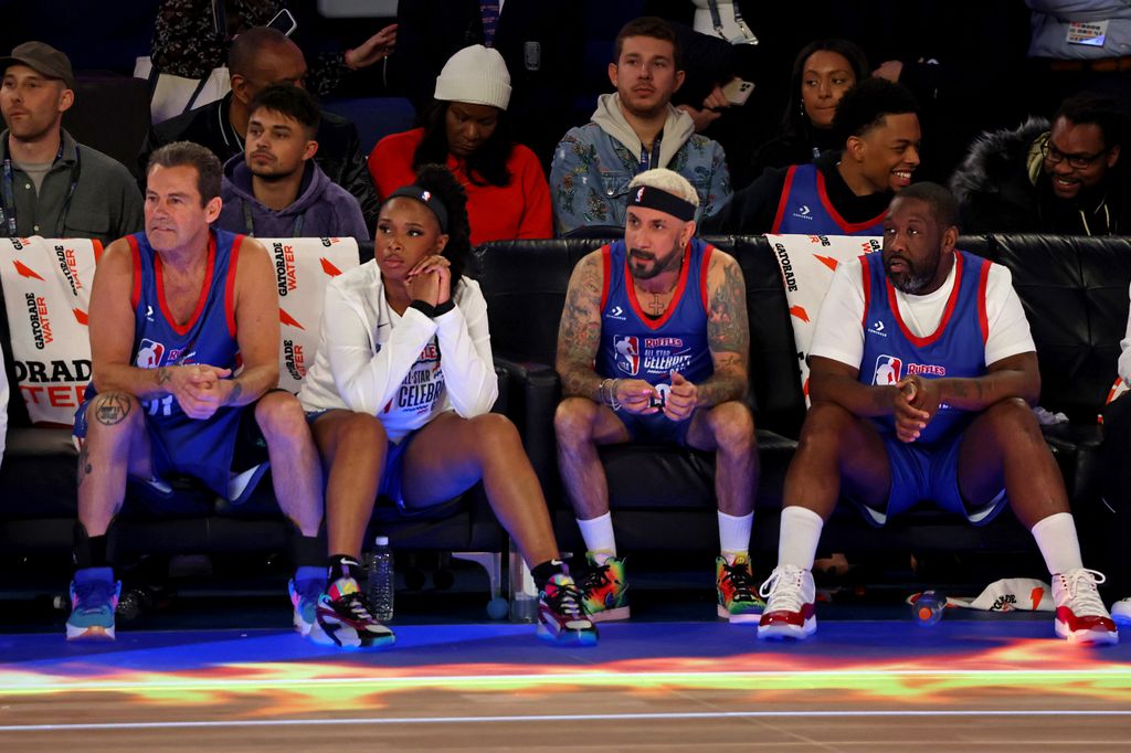 Jack "Black Jack" Ryan, Jennifer Hudson, AJ McLean, and Adam Blackstone react during the 2024 Ruffles NBA All-Star Celebrity Game