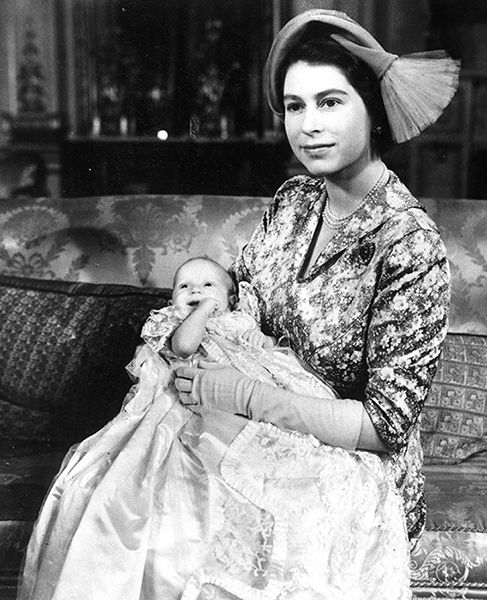 the queen holding princess anne