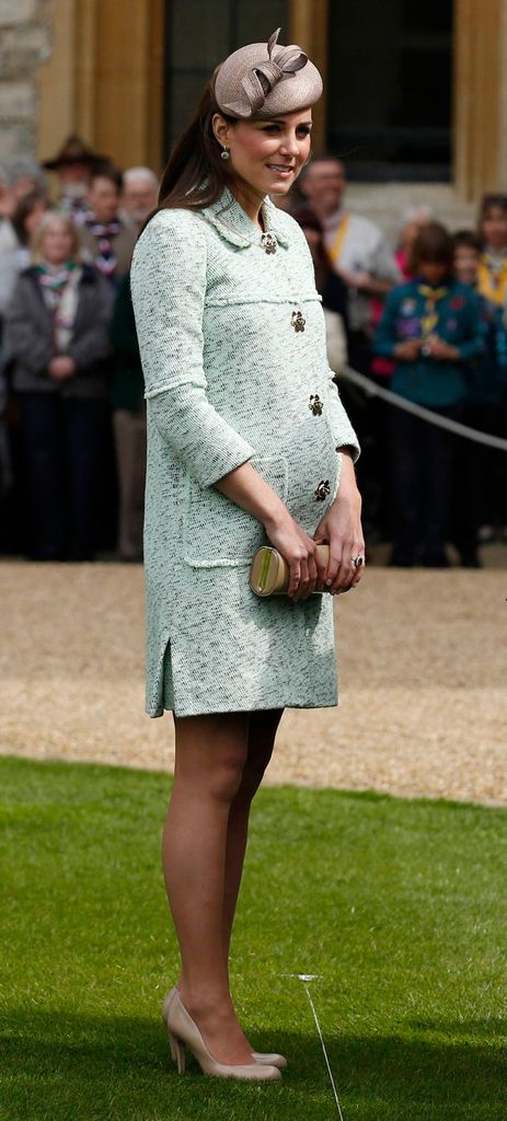 Catherine outside in seafoam coat dress