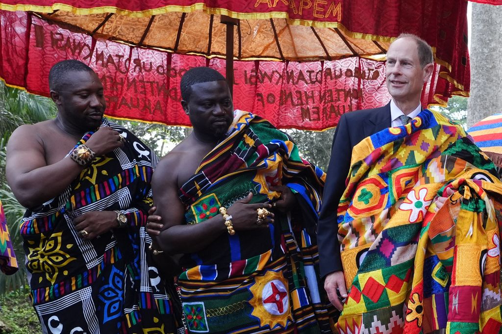 The Duke of Edinburgh wearing a local garment during a visit to Aburi Botanical Gardens in Ghana