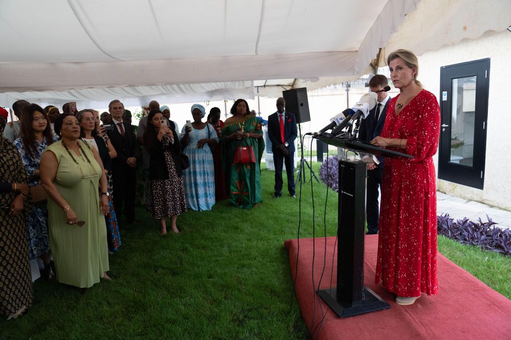 The Duchess of Edinburgh giving speech in red dress