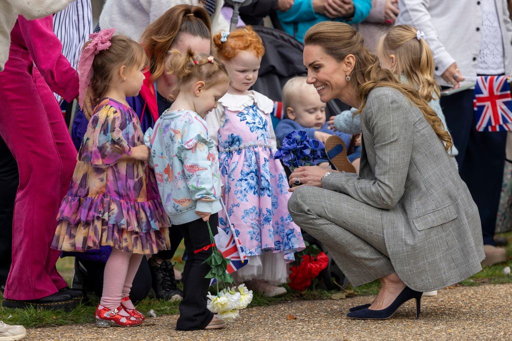 Kate Middleton talking to children at RAF Coningsby