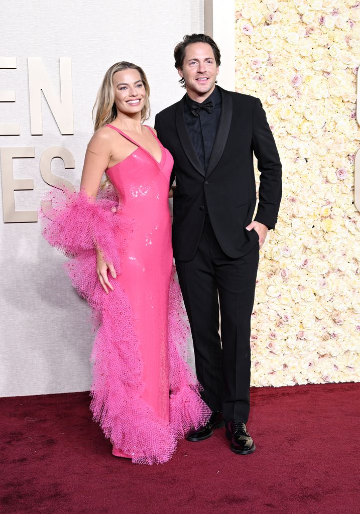 Margot Robbie e Tom Ackerley no 81º Globo de Ouro realizado no Beverly Hilton Hotel em 7 de janeiro de 2024 em Beverly Hills, Califórnia.