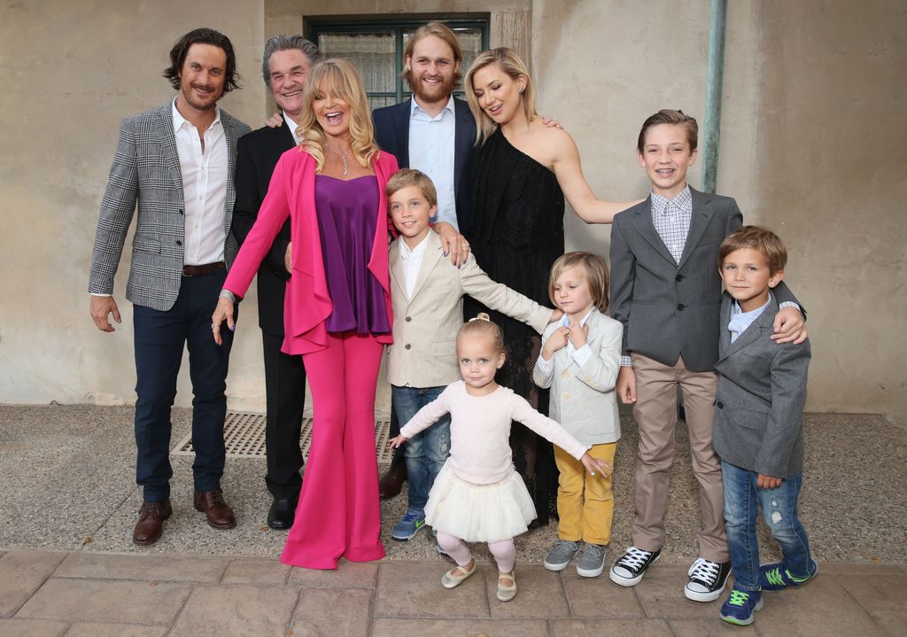 Actors Oliver Hudson, Kurt Russell, Goldie Hawn, Wyatt Russell and Kate Hudson with kids Ryder Robinson, Wilder Hudson, Bodhi Hudson, Rio Hudson and Bingham Bellamy attend Annual Goldie's Love In For Kids hosted by Goldie Hawn at Ron Burkle's Green Acres Estate on May 6, 2016 in Beverly Hills, California