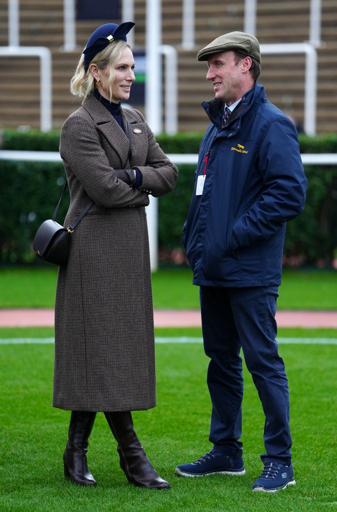 Zara wore leather gloves and a satin skirt by Cefinn