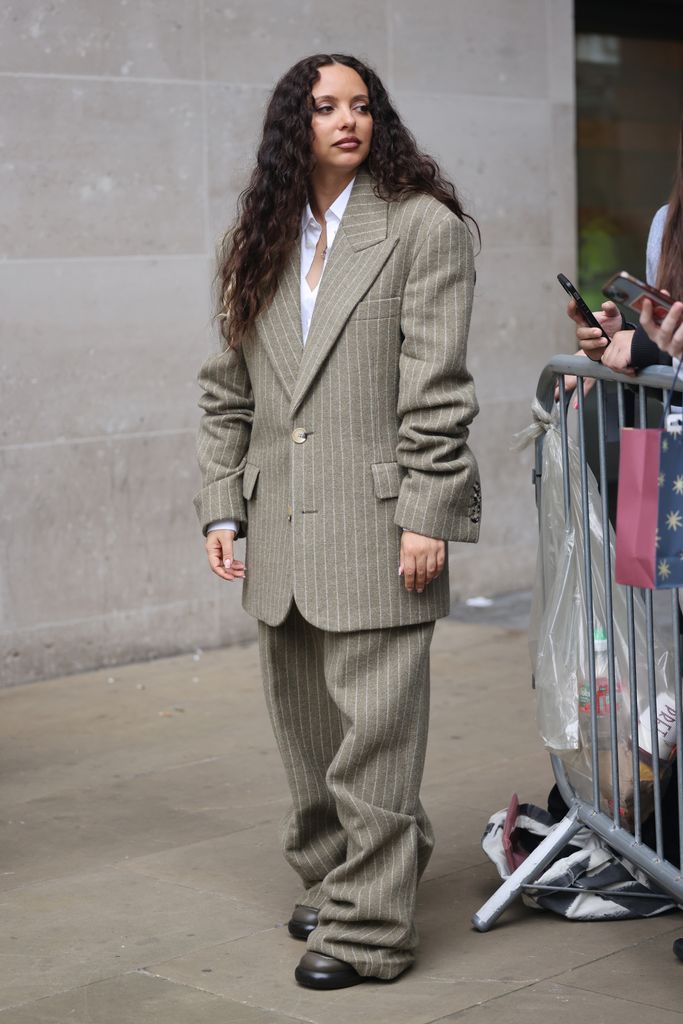 Jade Thirlwall in striped greige suit