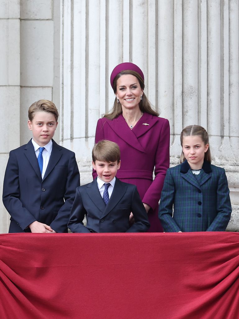 Kate and three children on balcony