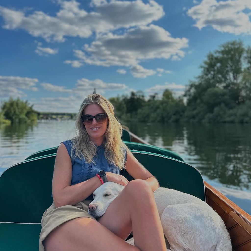 Marina Fogle with a dog in a boat