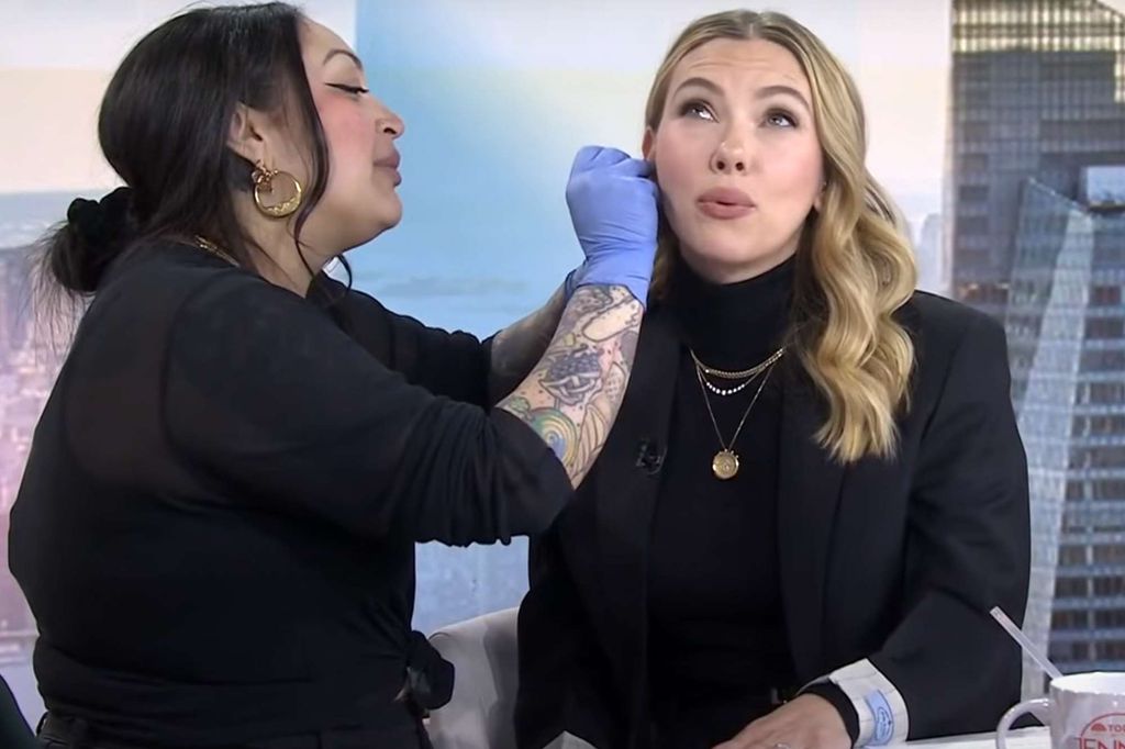 Scarlett Johansson gets her ears pierced live on air