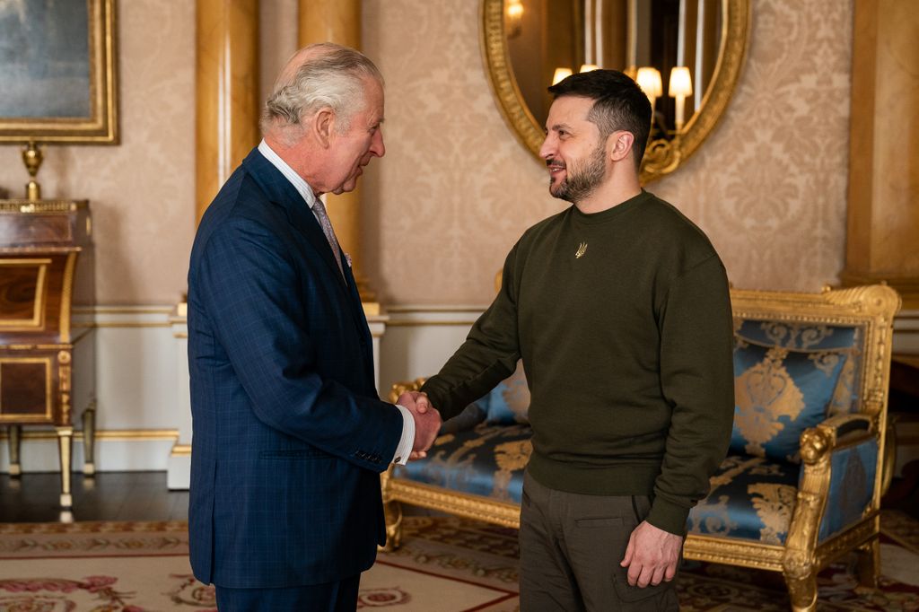  King Charles shaking hands with President Volodymyr Zelenskyy at Buckingham Palace in February last year