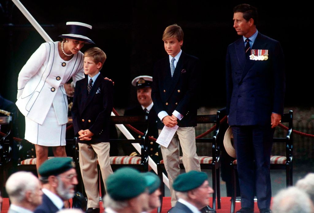 Prince Charles And Prince William  Watching The Parade Of Veterans  Whilst  Princess Diana Puts Her Arm Around Prince Harry And Talks To Him On  V J Day