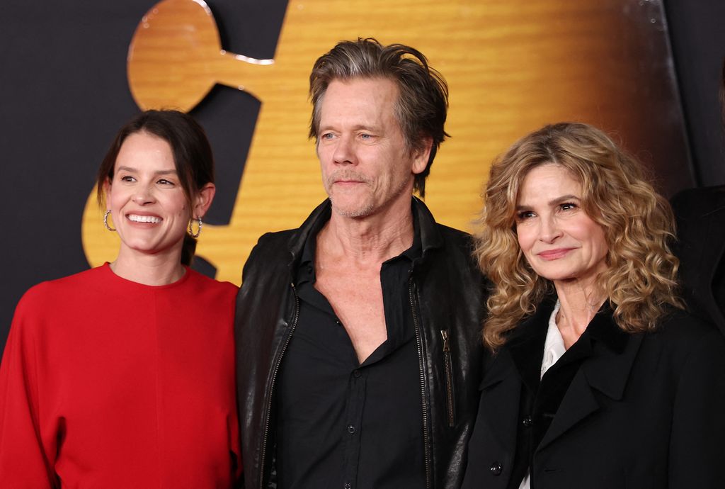 Sosie Bacon (L) with her parents actors Kevin Bacon and Kyra Sedgwick arrive for the premiere of the Bob Dylan biopic "A Complete Unknown" at the Dolby Theatre in Hollywood, California on December 10, 2024