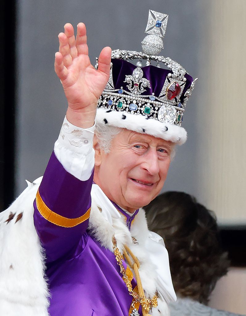 King Charles waving with crown