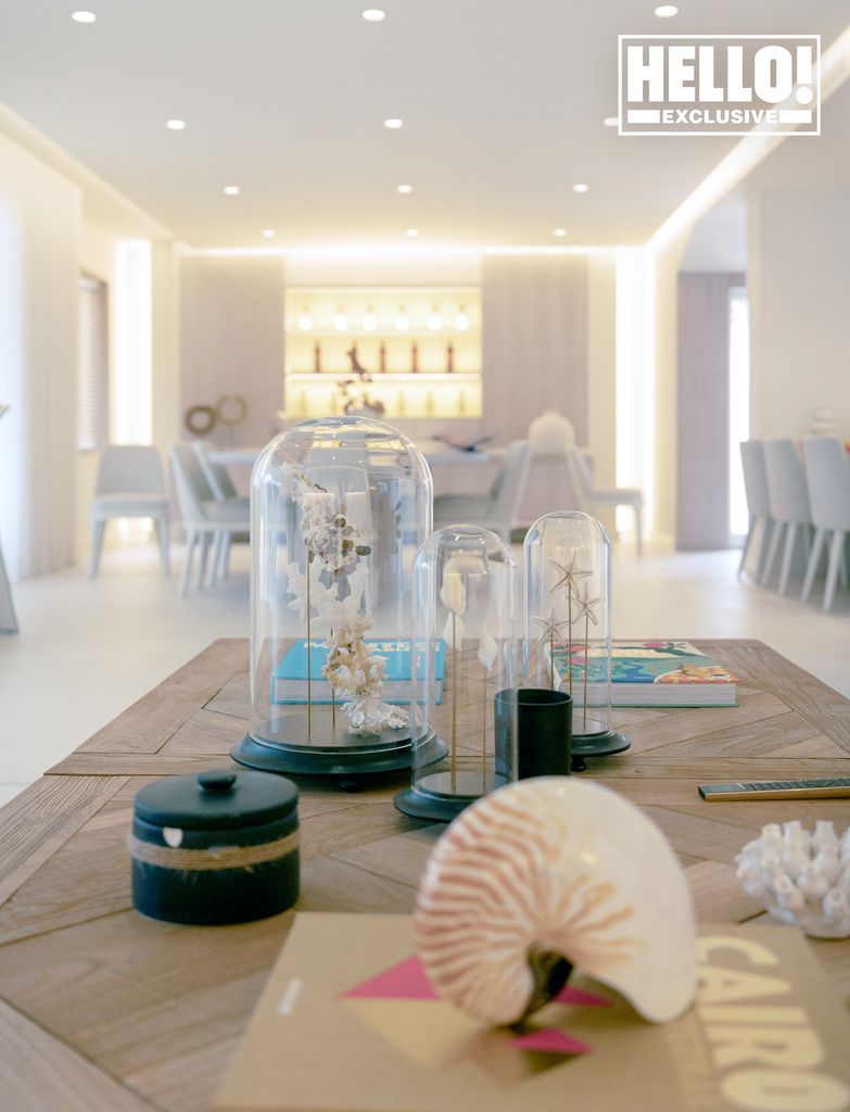 Eva Longoria's dining table at Marbella home with glass decorations and shells 