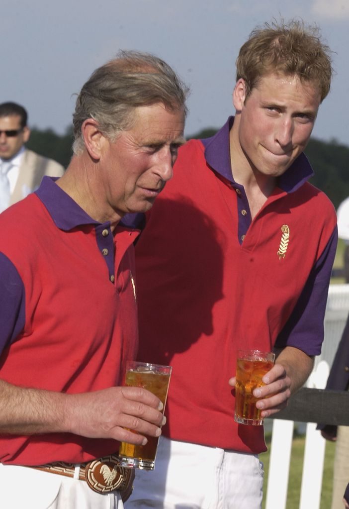 Charles the Prince of Wales and his son Prince William enjoy a refreshing drink at a polo match at Windsor Great Park following the second day of Royal Ascot on June 16, 2004 in Windsor, England.