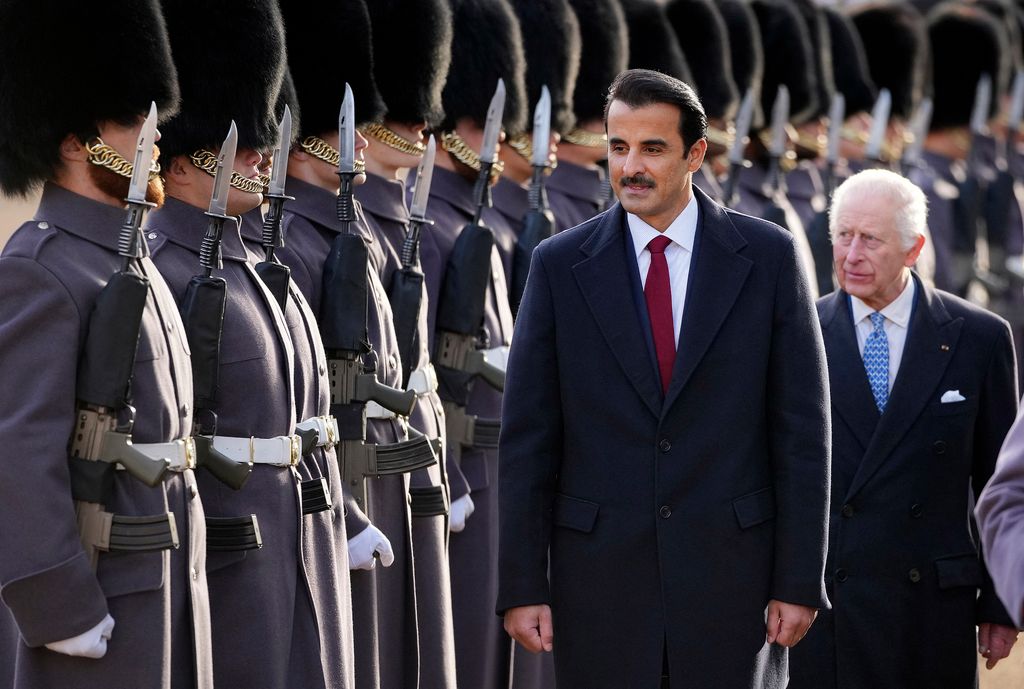 two men inspecting guard of hnour