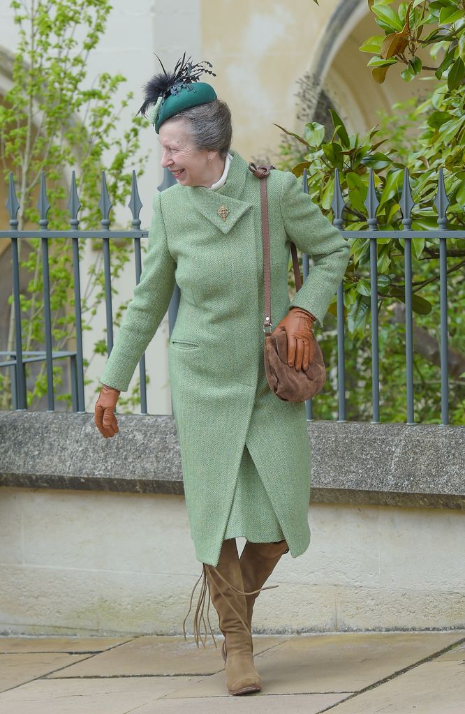 Princess Anne in a lovely green coat and fringed boots