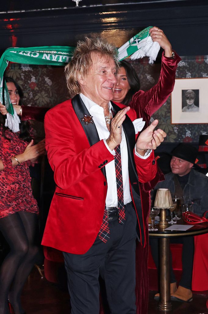 Sir Rod Stewart in a red blazer