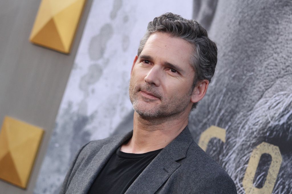 actor posing on red carpet, close-up