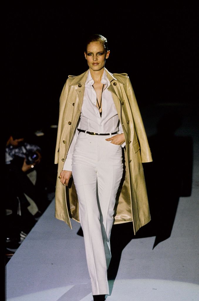 Model walks Gucci's RTW (pret a porter) Fall 1996 Runway collection designed by Tom Ford. 