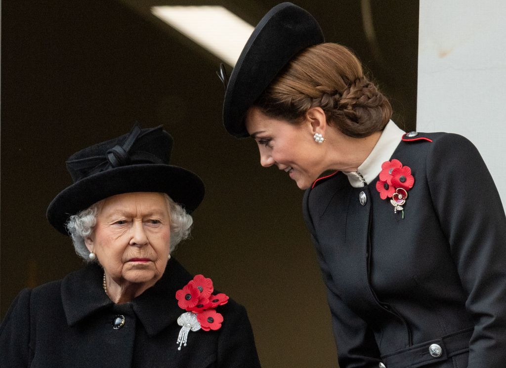 Queen Elizabeth II and Catherine, Duchess of Cambridge chatting to each other during the annual Remembrance Sunday memorial