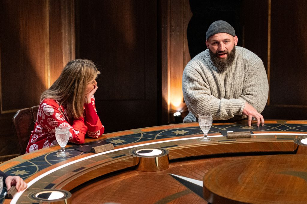 Kate Garraway looking at Joe Marler as he speaks on Celebrity Traitors