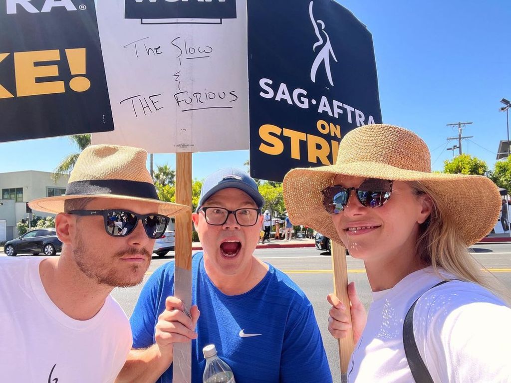 Jesse Lee Soffer, with executive producer Derek Haas and former co-star Tracy Spiridakos on the picket lines 