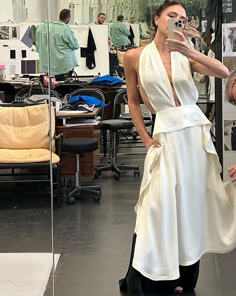 Victoria Beckham Wearing Halter Dress In Atelier