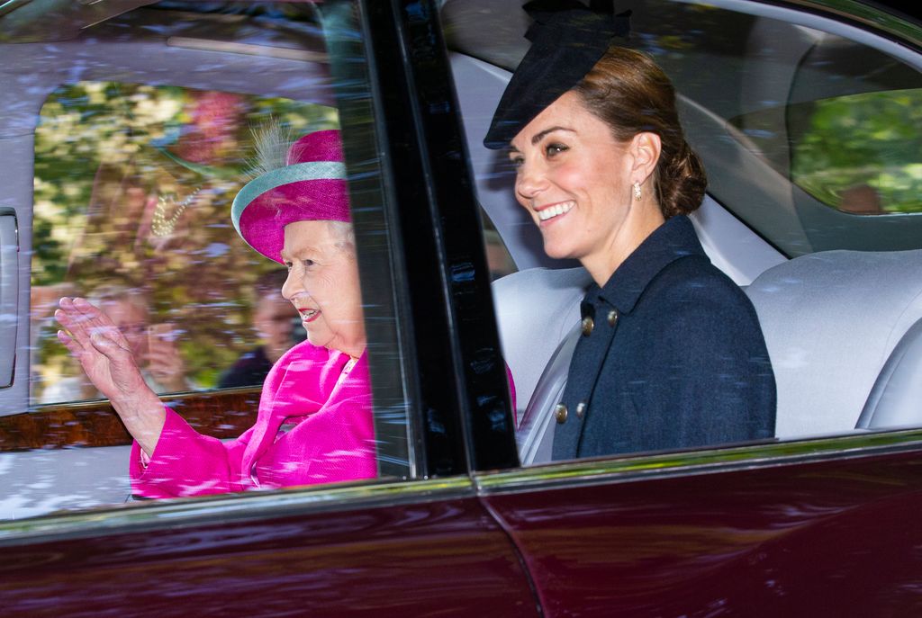 Queen Elizabeth II and Catherine, Duchess of Cambridge are driven to Crathie Kirk Church before the service on August 25, 2019