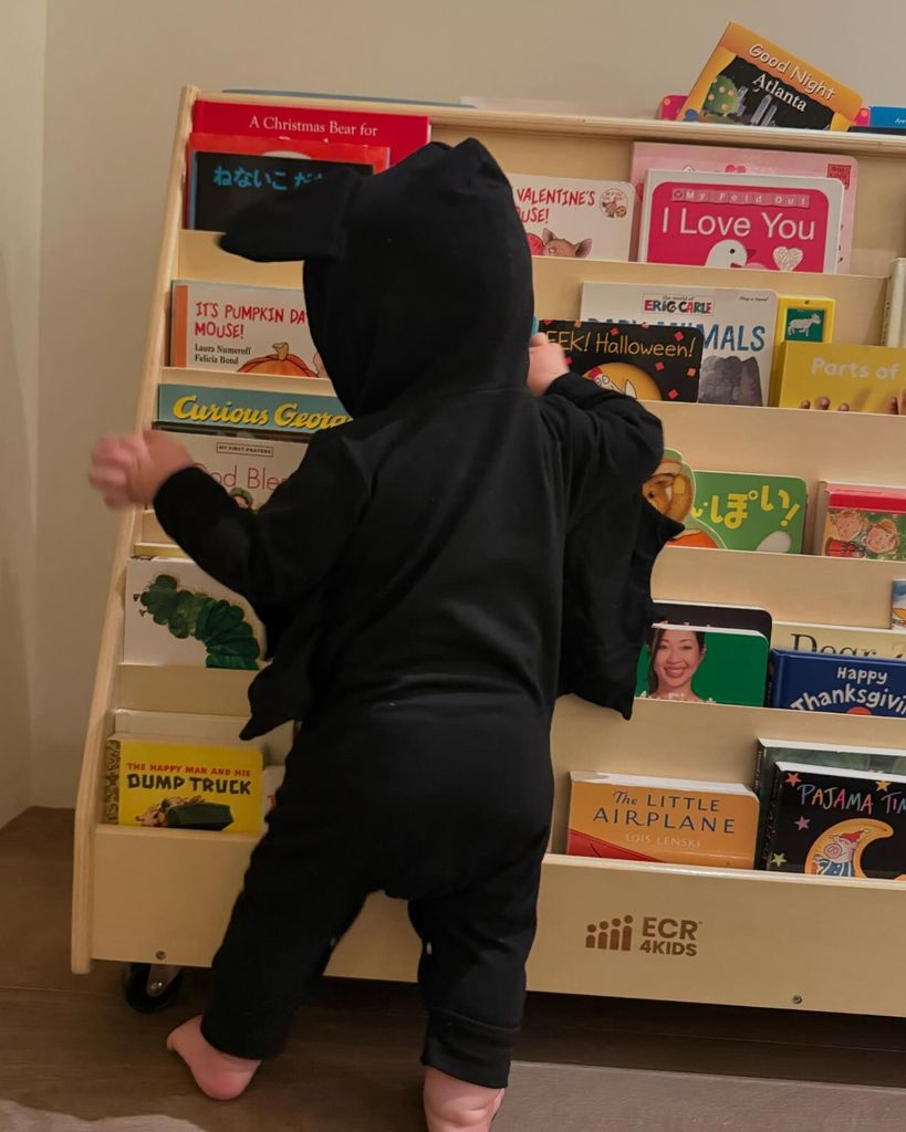 Kourtney Kardashian's son Rocky wearing black onesie 