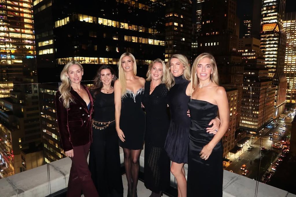 Ivanka Trump in black dress surrounded by her friends in NYC