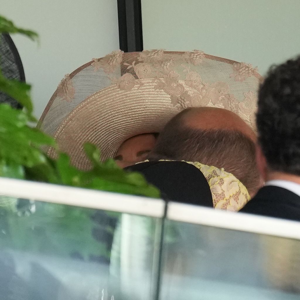 William and Carole hugging