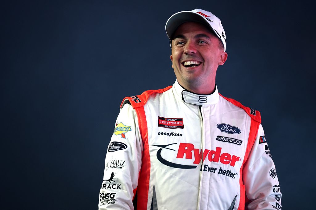 Frankie Muniz, driver of the #33 Ryder Ford, walks onstage during driver intros prior to the NASCAR Craftsman Truck Series Baptist Health 200 at Homestead-Miami Speedway on March 21, 2025 in Homestead, Florida