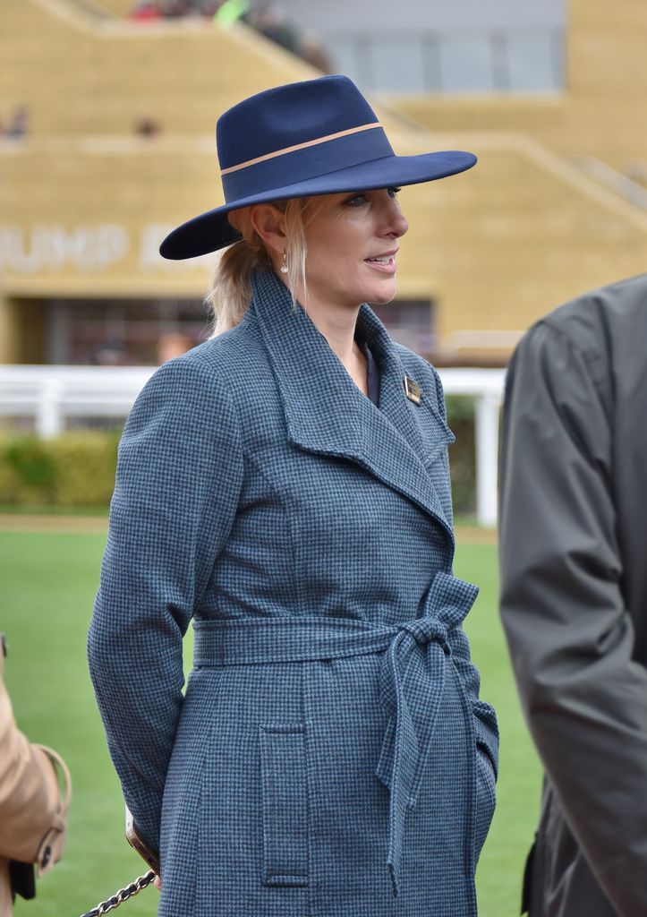 Zara Tindall in blue hat and coat