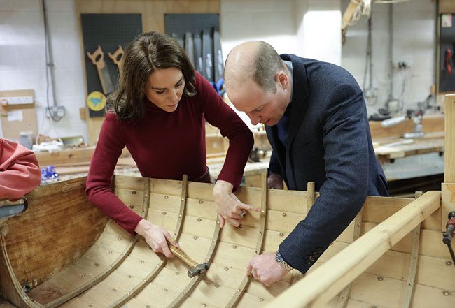 Prince and Princess of Wales try boat building
