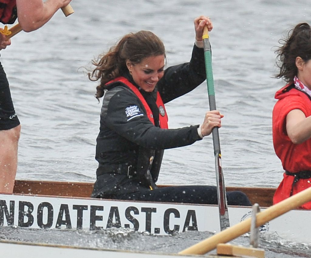 Catherine, Duchess of Cambridge rows in a dragon boat across Dalvay lake on July 4, 2011 in Charlottetown, Canada. 