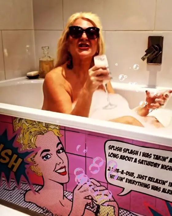 vanessa feltz in bath with sunglasses and drink