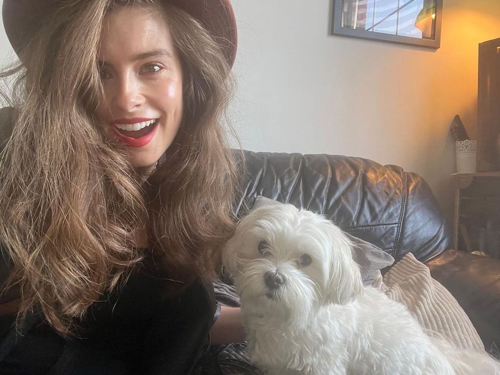 Rachel Shenton at home with her Maltese Rosie