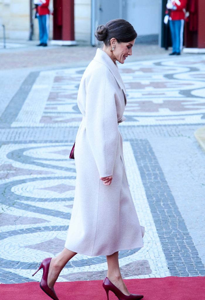 Queen Letizia paired the & Other Stories coat with Magrit pumps