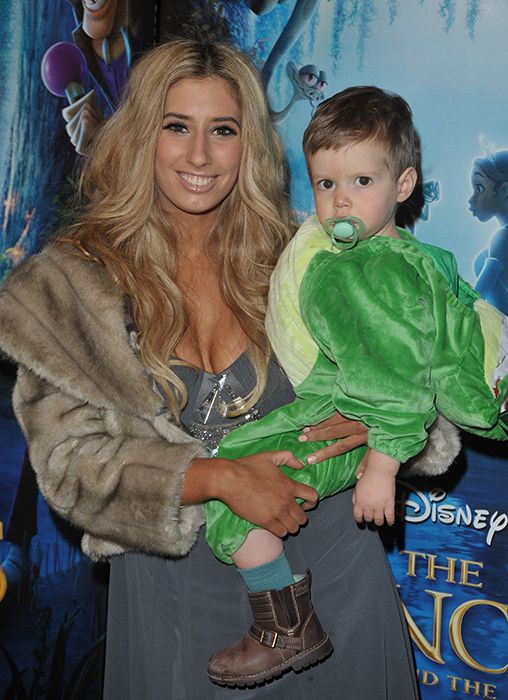 Stacey Solomon carries young son Zachary