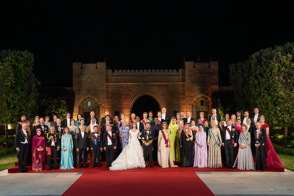 Princess Beatrice, Princess Kate and more royals posed for an official wedding photo at Prince Hussein and Princess Rajwa's state banquet