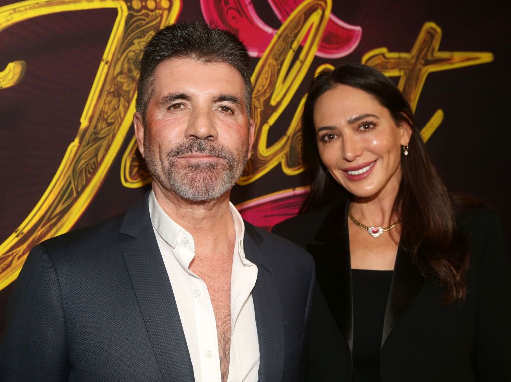 Simon Cowell and Lauren Silverman pose at the opening night of the new musical 