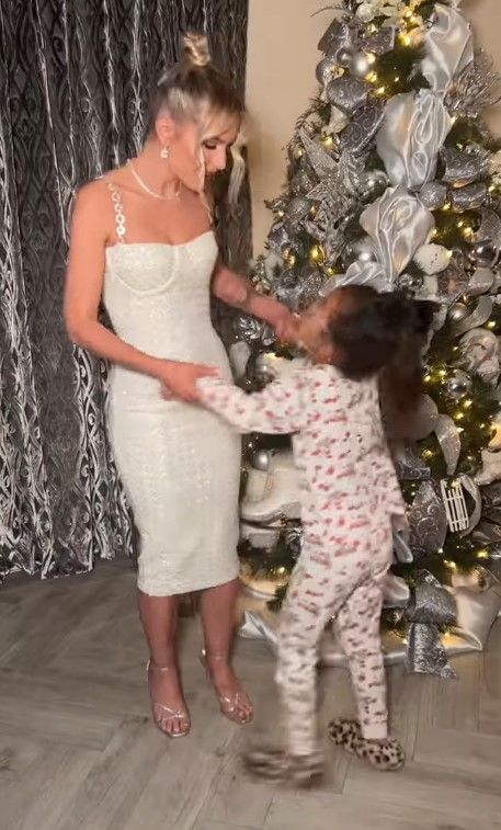 helen flanagan with daughter in front of tree