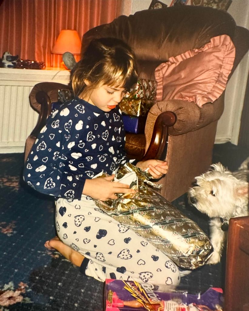 Young Gemma opening christmas presents
