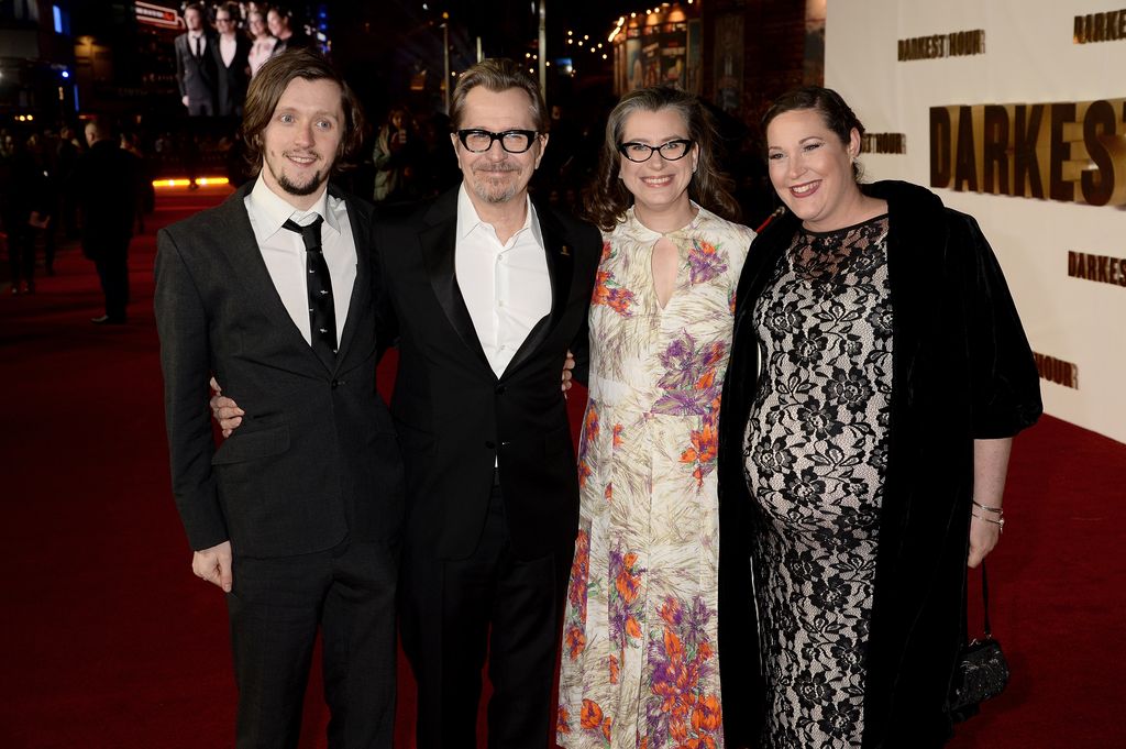 Alfie Goldman, Gary Oldman, Gisele Schmidt and a pregnant woman at a premiere